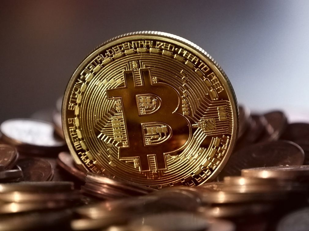 Cryptocurrency coins to represent trading scams